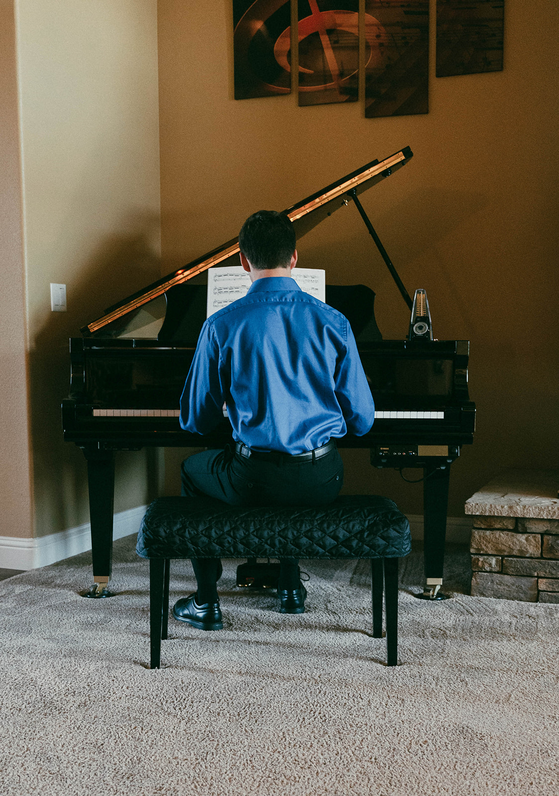 Hunter playing grand piano